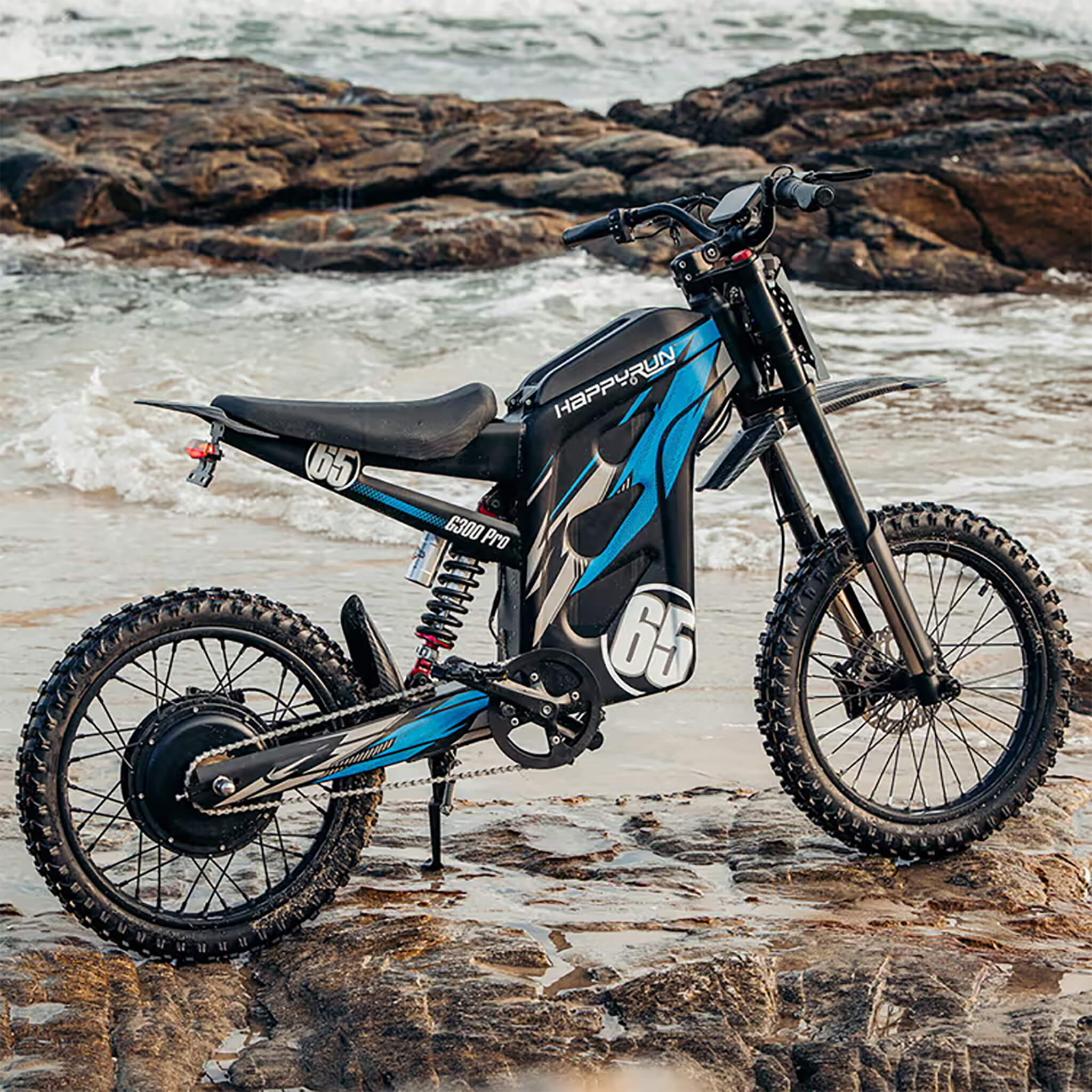 Happyrun G300 Pro Electric Dirt Bike (SAK27360) Saksby - Orange With Man Riding and Making a Jump 